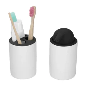 Black and white tooth brush dispenser
